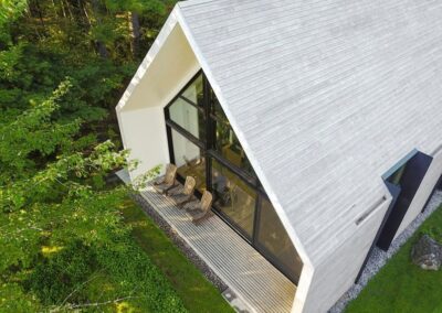 L - Light grey cladding barn style cabin