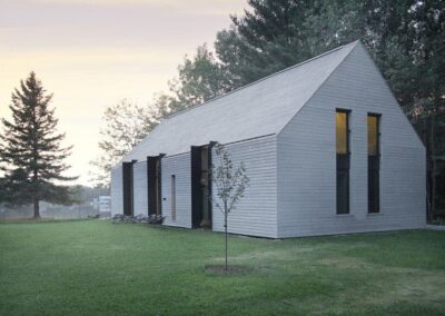 L - Light grey cladding barn style cabin front